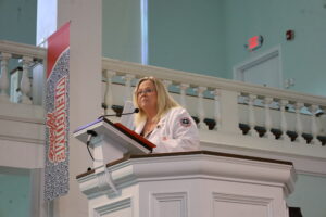Dr. Kimberly White speaks to the audience during the School of Nursing White Coat Ceremony at West Virginia Wesleyan College.