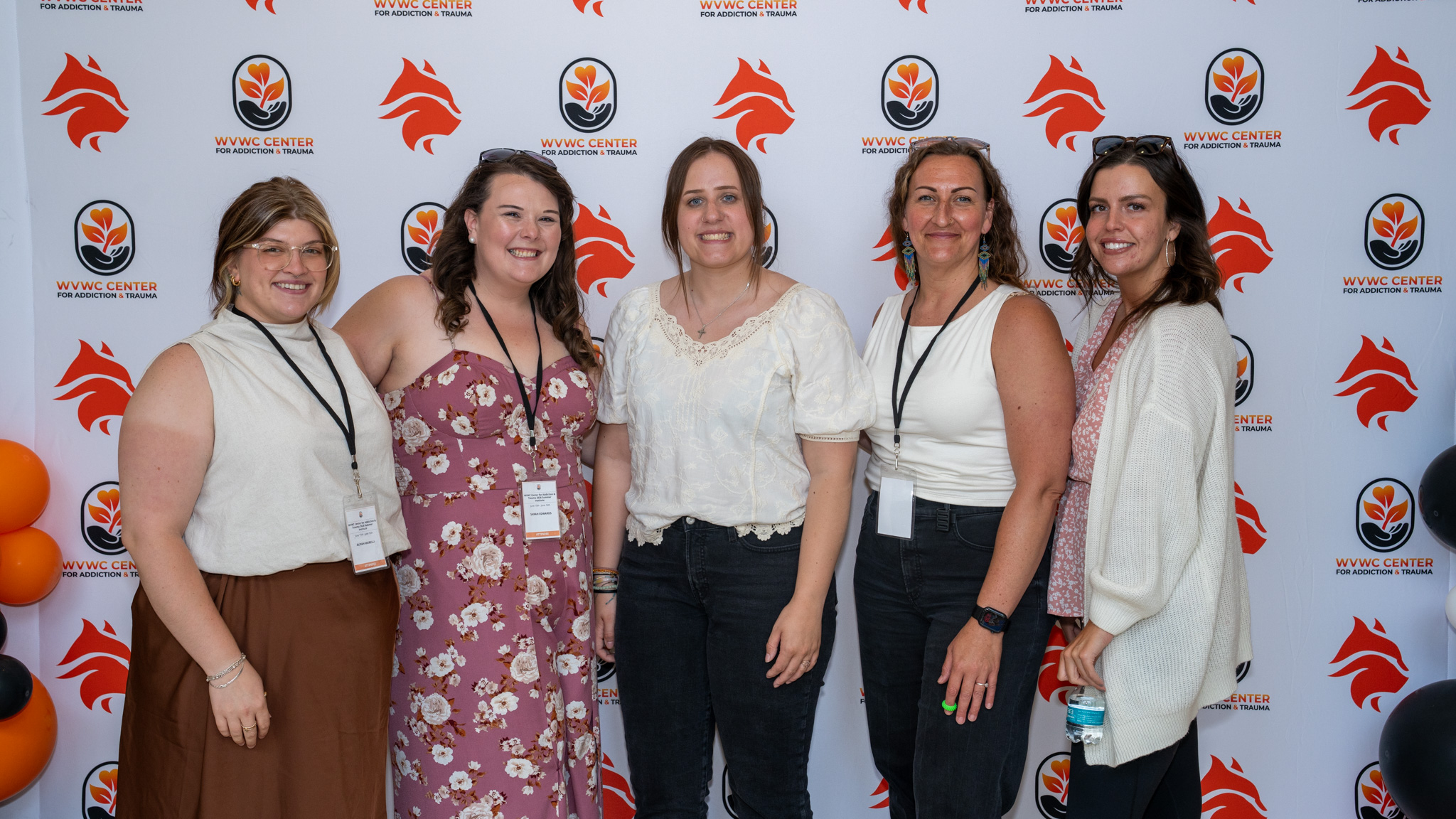 Five female attendees stop for a group photo at the 2026 Summer Institute hosted by the Center for Addiction and Trauma at West Virginia Wesleyan College.